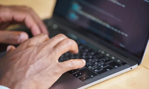 hands-typing-on-a-laptop-computer