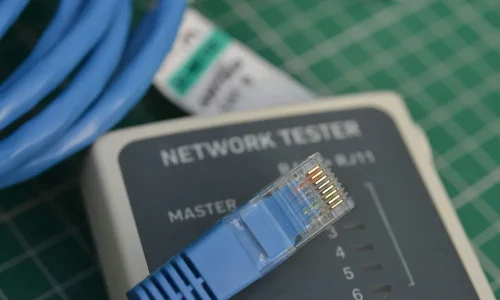 a-close-up-of-a-network-tester-on-a-Cable